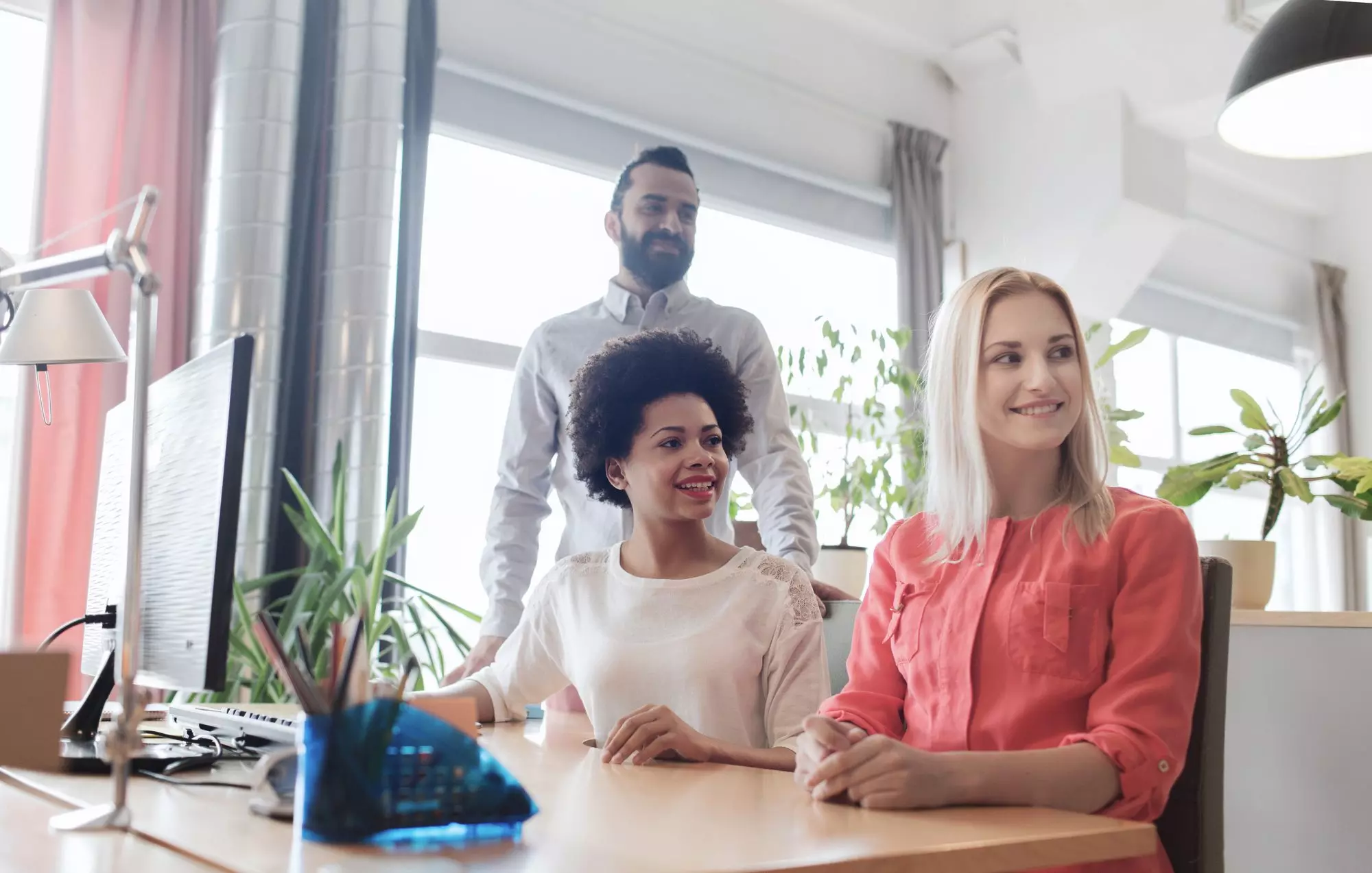 Creative business startup team working together in a modern office environment